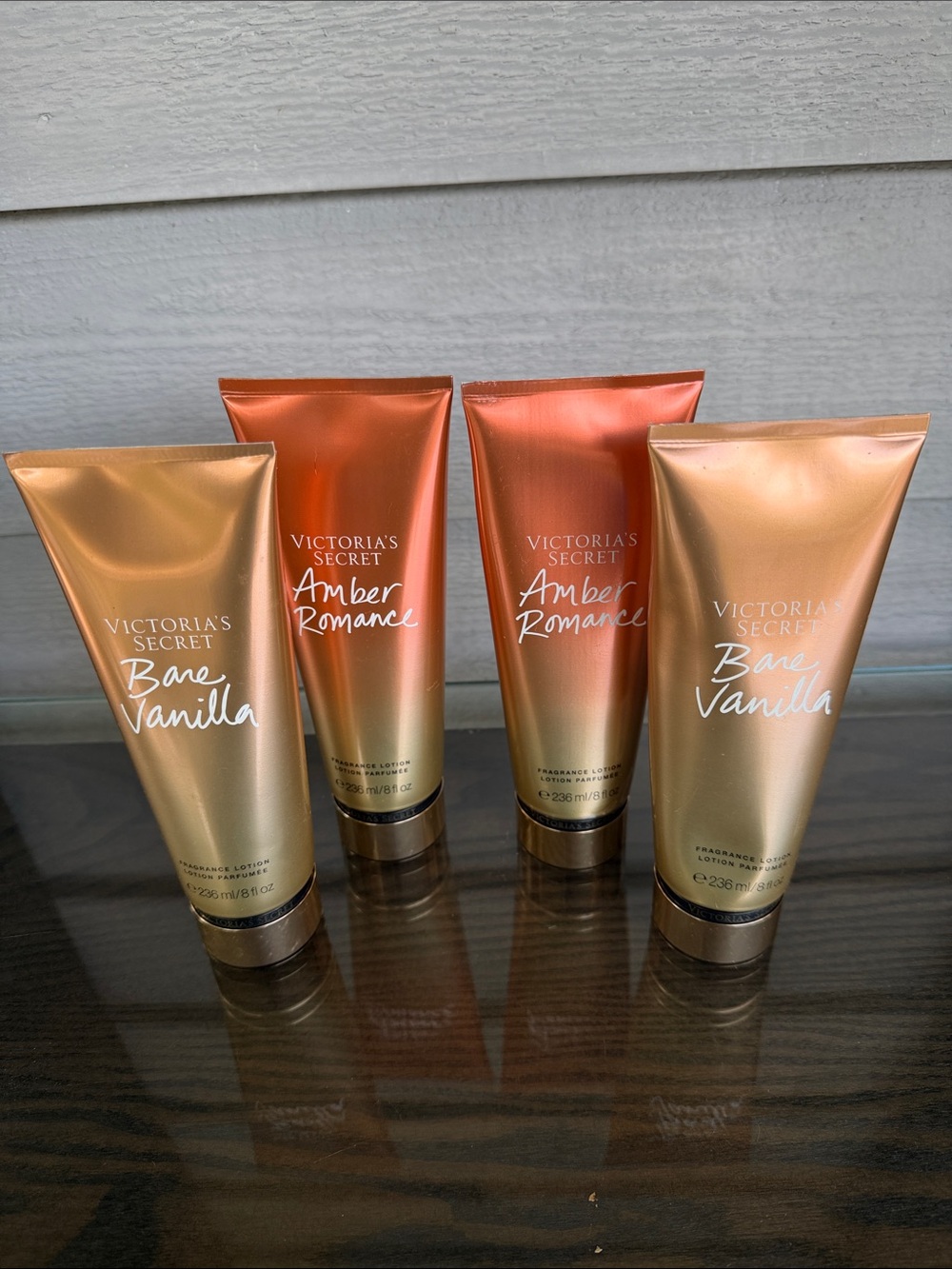 Victoria's Secret Bare Vanilla & Amber Romance Body Lotions in Gold and Orange